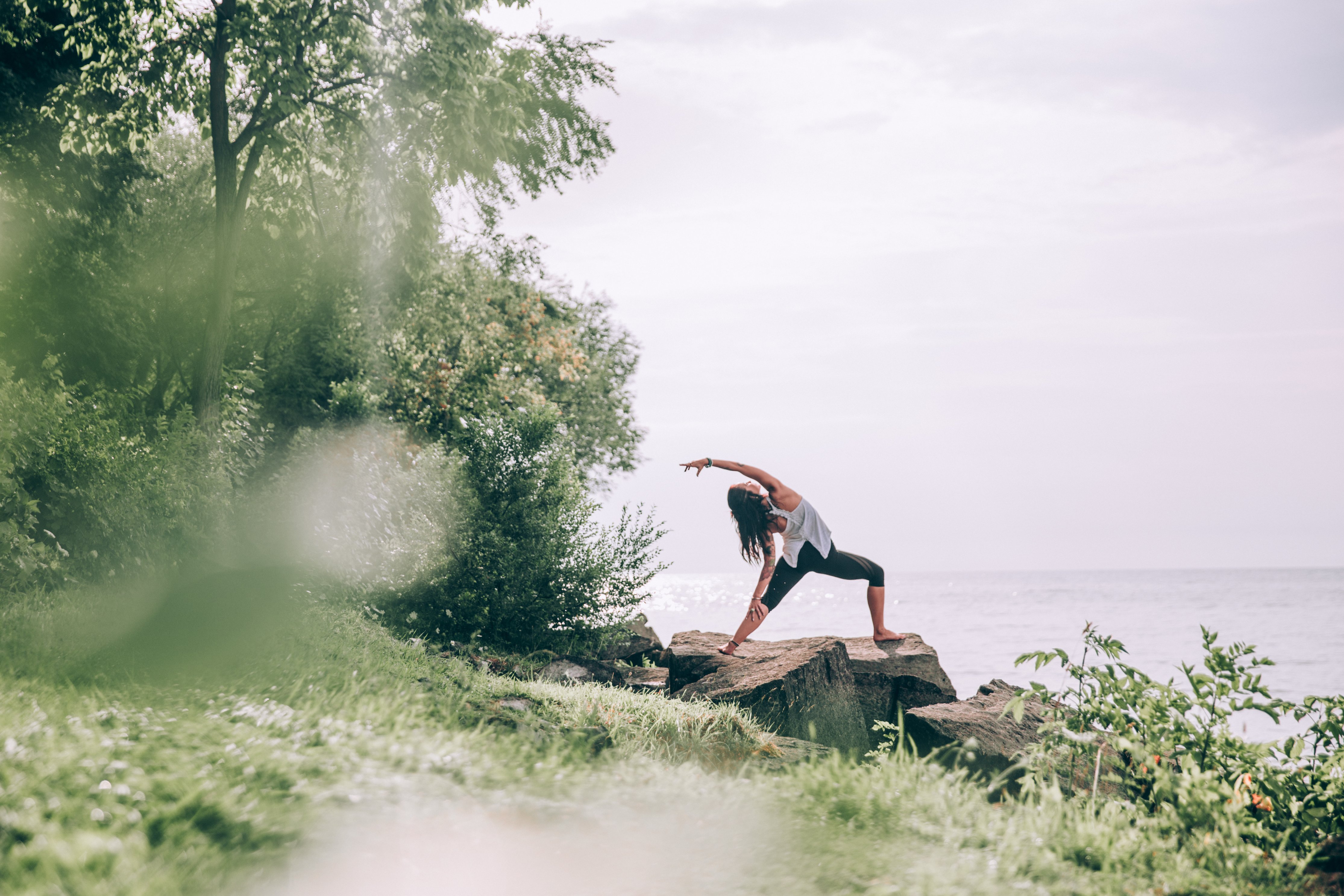 https://yoghappiness.com/wp-content/uploads/2019/07/yoga-poses-on-seaside-rocks.jpg